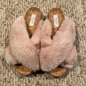 Brand new! Pink fur slippers good for indoor or outdoor. Never worn!